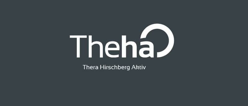 Weißes neues Theha-Logo auf grauem Untergrund